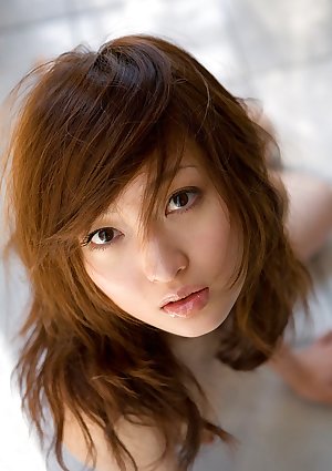 Japanese teen Maiko Kazano wets her great tits and bush while taking a bath