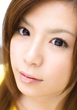 Adorable Japanese girl Riri Kuribayashi exposes her trimmed pussy