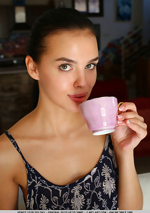 Exotic teen Venice Lei is ready for nude posing after her morning coffee