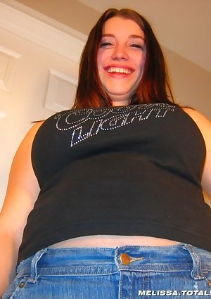 Melissa sheds her denim skirt to reveal her full moon ass
